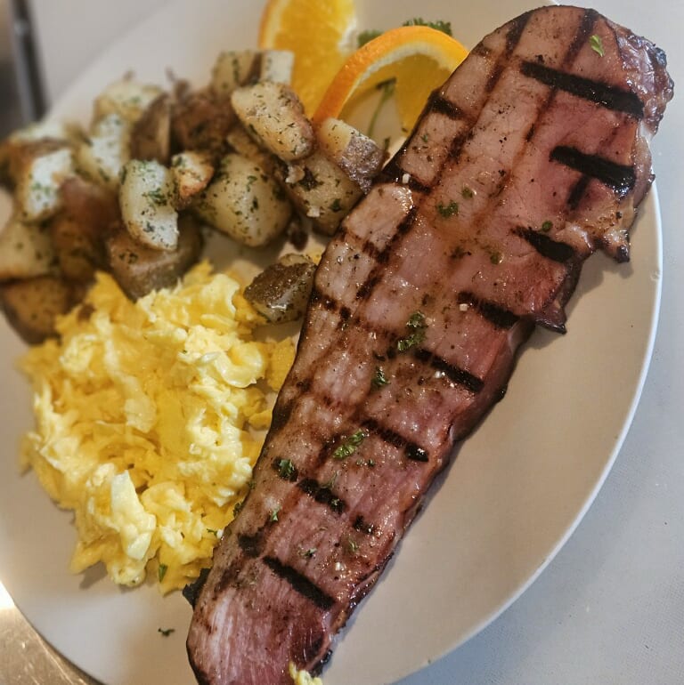 Two Eggs Any Style with Ham Steak.